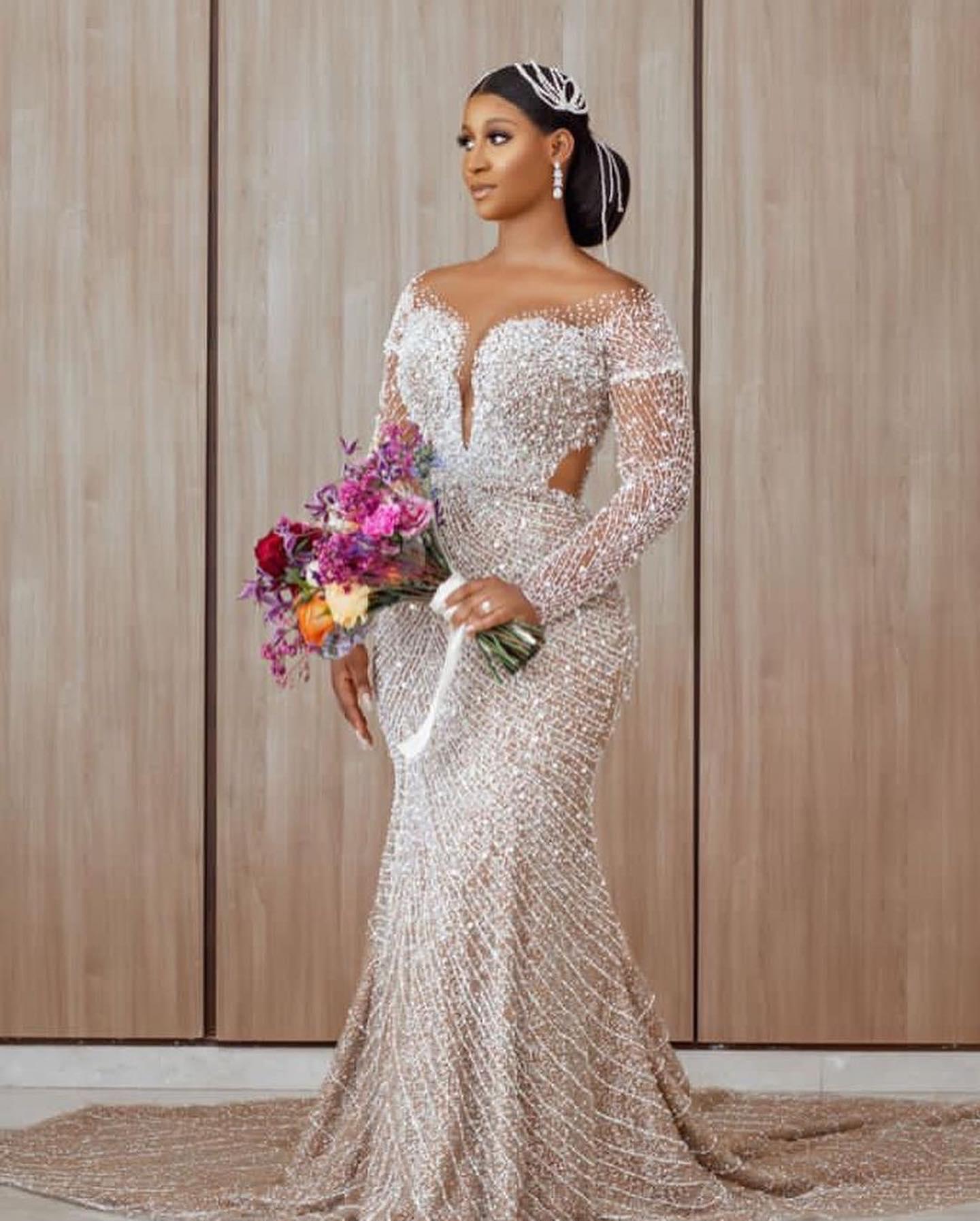 C2022-BB28 - Sheer long sleeve Crystal and Pearl beaded wedding gown