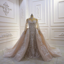 Style #T422 - sheer illusion neckline long sleeve wedding gown with detachable train