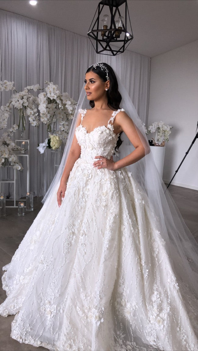 C2022-BGS552 - sleeveless open neck ball gown wedding dress with detachable over skirt train