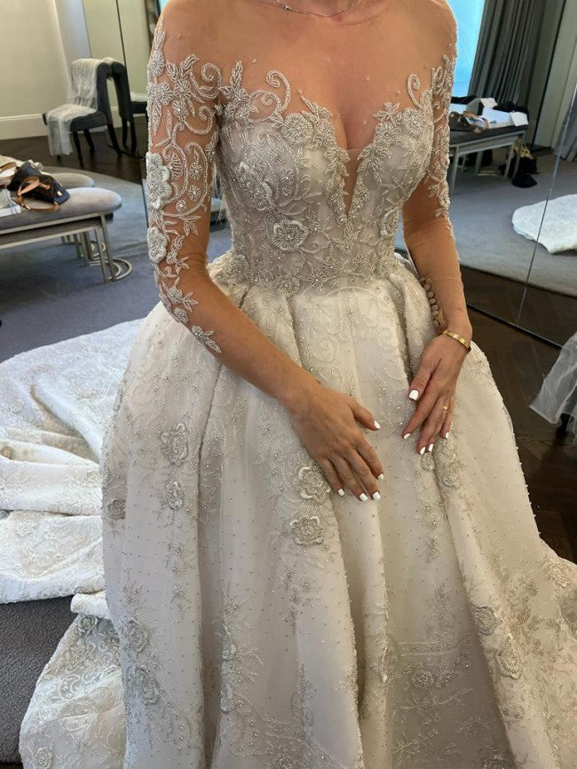 C2022-SLS009 - Sheer illusion neckline long sleeve beaded wedding ball gown