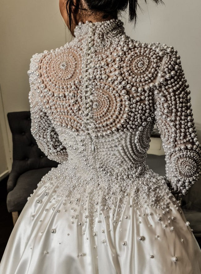 long pearl dress Embellished Strapless Train Wedding 42 Long sleeves add extra covering and elegance to the fitted dress with its embroidered pearl pattern KissProm Long Sleeve Pearl Pink