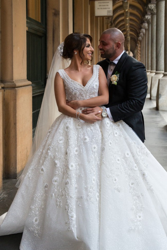 C2022-sbg202 sleeveless beaded ball gown wedding dress with open neckline.