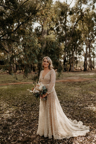 C2023-LL694 - sheer long sleeve beaded v-neck wedding gown