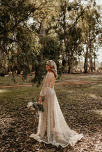 C2023-LL694 - sheer long sleeve beaded v-neck wedding gown