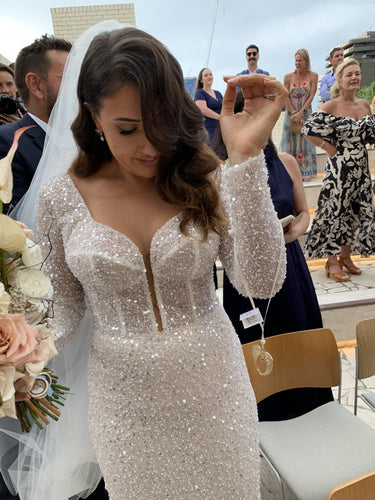 C2022-BLS909 - White beaded long sleeve wedding gown