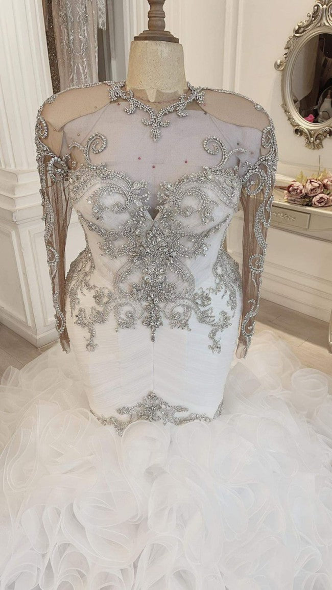 C2022-SLS69: vestido de novia de talla grande, entallado y con vuelo, con pedrería, escote ilusión transparente, mangas largas y adornos brillantes