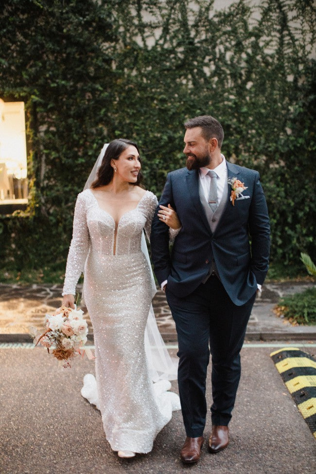 C2022-BLS909 - White beaded long sleeve wedding gown