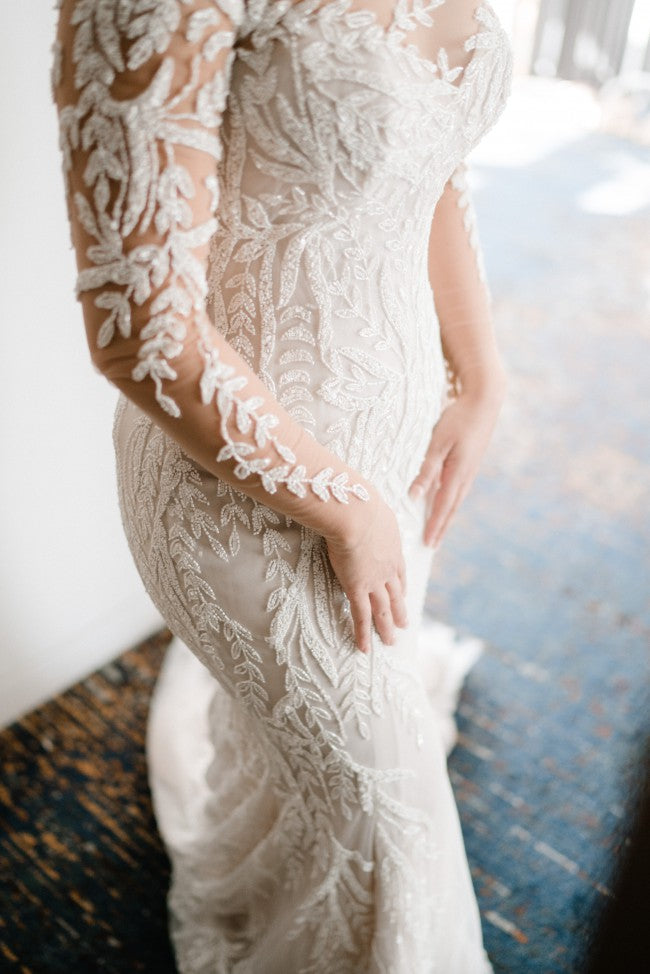 C2023-B551 - sheer illusion neck long sleeve wedding gown with detachable overskirt