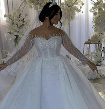 C2022-BB2T7 Sheer beaded long sleeve ball gown wedding dress