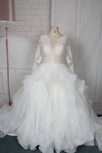Style 95024 Sheer long sleeve lace bridal gowns with large ball gown skirt