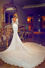 Style #C2015-KBls - Replica of long sleeve v-neck wedding gown