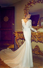 Style #C2015-KBls - Replica of long sleeve v-neck wedding gown