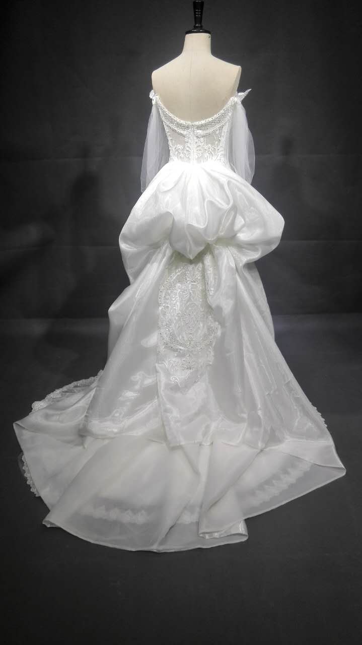 Vestido de novia de manga larga transparente de alta costura a la venta 