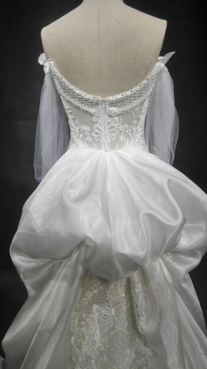 Vestido de novia de manga larga transparente de alta costura a la venta 