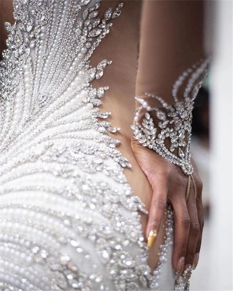 C2022-SLSB448 - Sheer long sleeve plus size wedding gown with Swarovski Crystal Bling