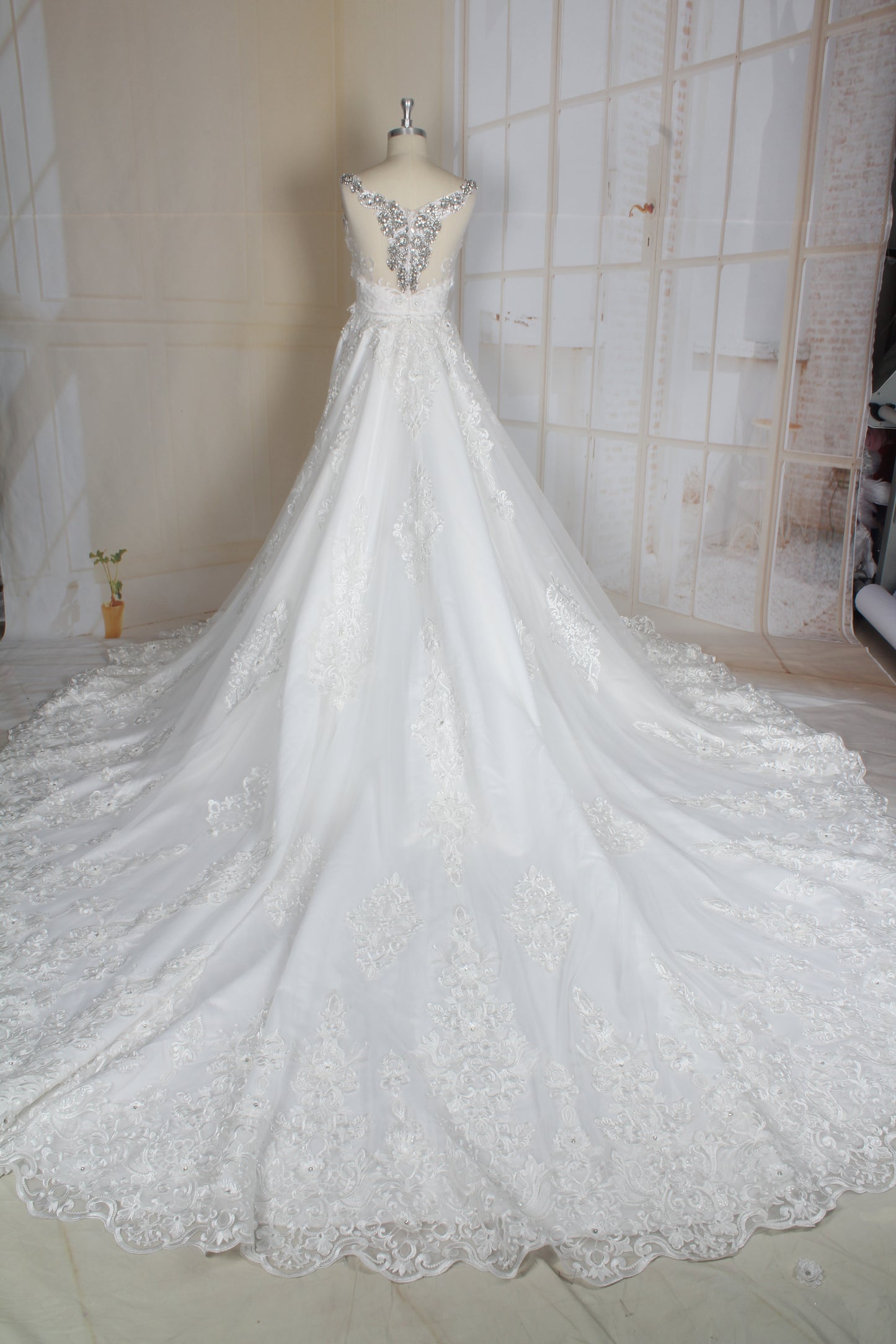 C2021-Perrline - Sleeveless swarovski crystal beaded wedding gown with detachable train