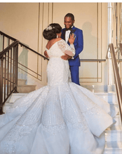 C2019 - LSP080 Off the shoulder long sleeve plus size fit-to-flare wedding gown