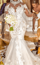 C2021-BiM012 - sheer long sleeve illusion neck line crystal beaded wedding gown with cathedral train