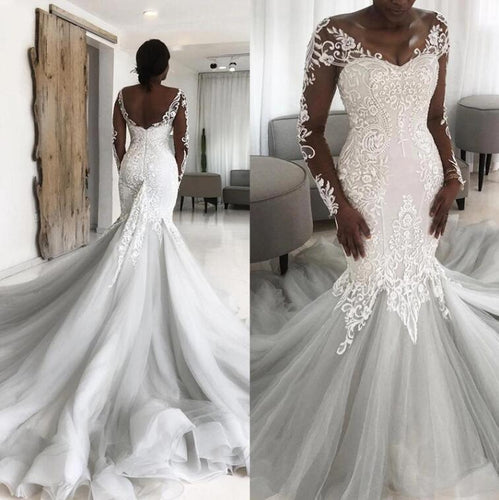 C511121 - Sheer long sleeve fit-and-flare wedding gown