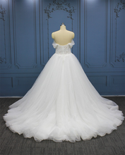 Style #WT4407 Strapless ball gown wedding dress with sheer are cuffs