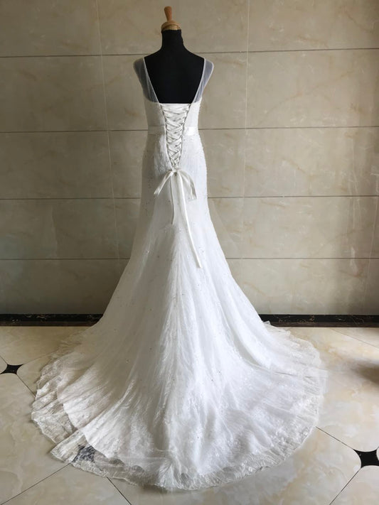 Style DOL-Y003 - Robe de mariée sans manches à décolleté illusion