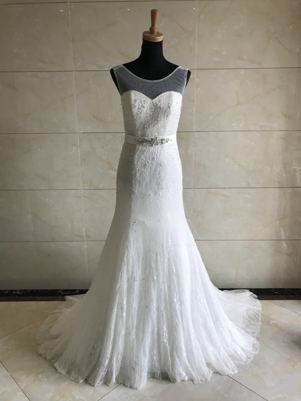 Style DOL-Y003 - Sleeveless illusion neckline wedding gown