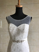 Style DOL-Y003 - Sleeveless illusion neckline wedding gown
