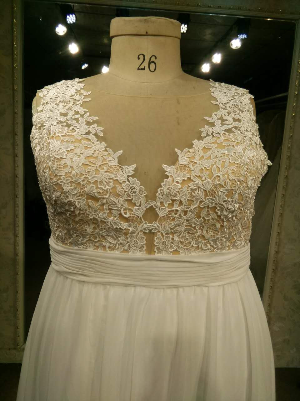 Sleeveless plus size wedding dress