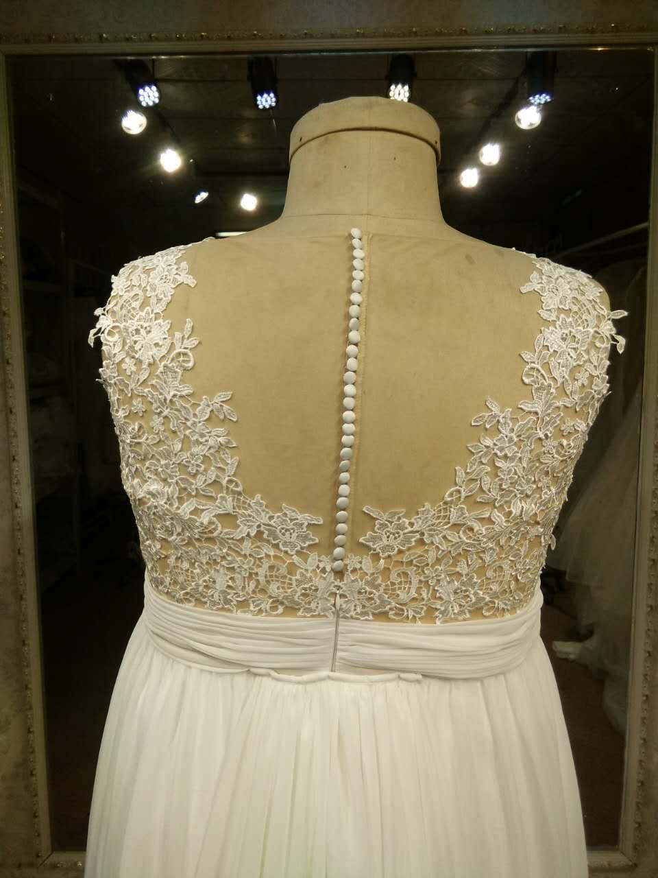 Sleeveless plus size wedding dress