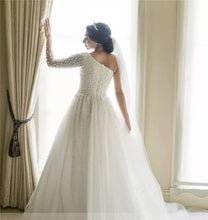 C2021-osP55 - Long sleeve one shoulder Pearl beaded wedding gown