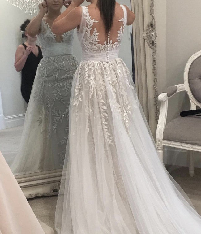 Robe de mariée de style trapèze au dos transparent sans manches
