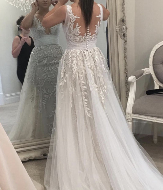 Robe de mariée de style trapèze au dos transparent sans manches